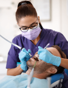 Image of a dentist cleaning teeth at Murfreesboro Family Dentistry